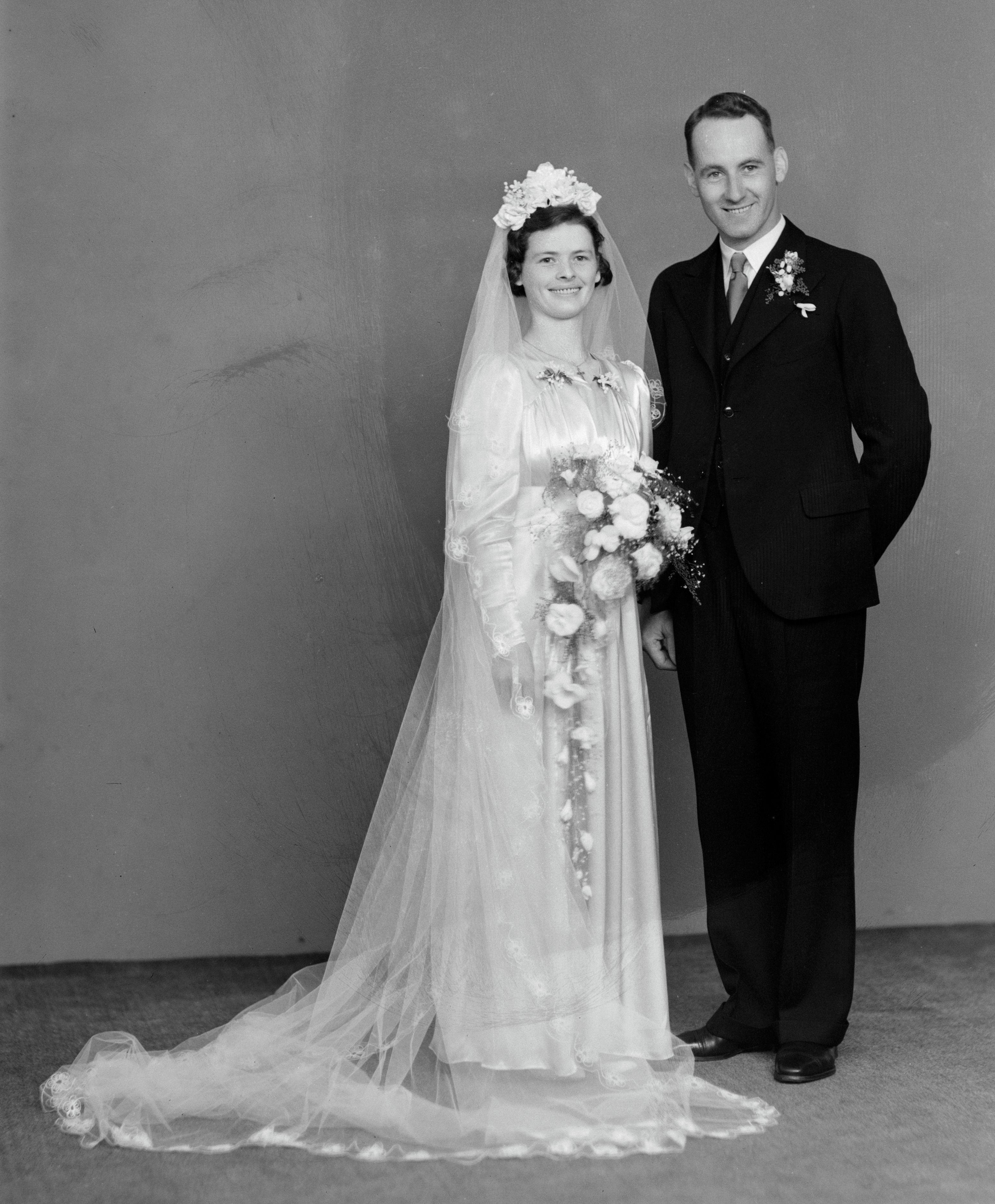 Marjorie Jensen and Patrick Bartle on their wedding day (9 February 1943). Swainson's Studios. Collection of Puke Ariki (WD.057532).
