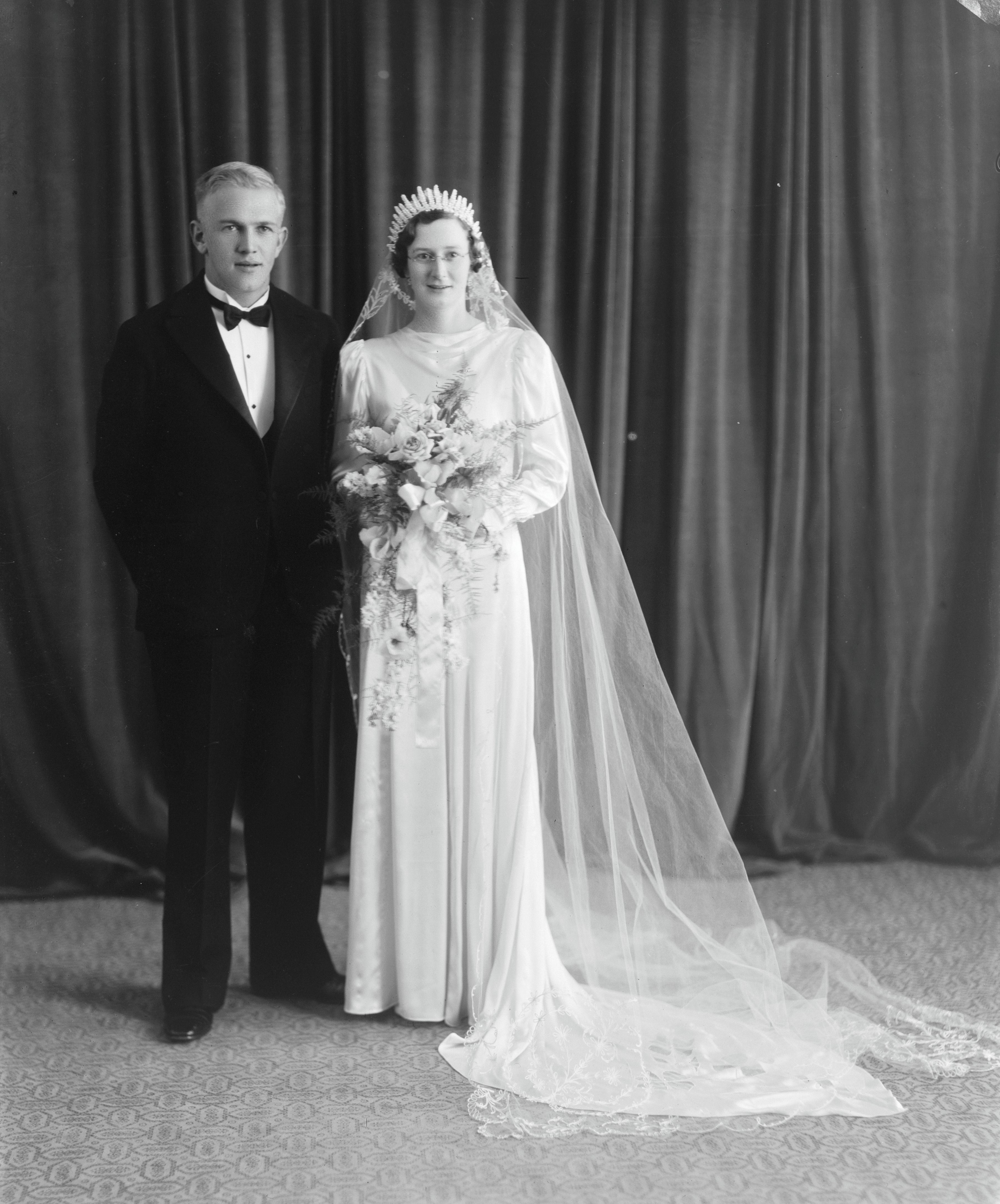 Addie Lile and Joan Franklyn on their wedding day (11 January 1938). Swainson's Studios. Collection of Puke Ariki (SW1931-1940.08004).
